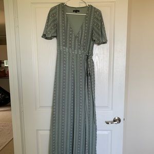 Long flowy wrap around green dress